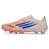 Botas de fútbol Adidas F50 Elite naranja y azul para terreno firme (FG).