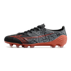 Bota de fútbol Mizuno Alpha negra y roja para terreno firme FG