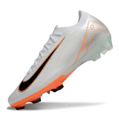 Botas de fútbol Nike Air Zoom Mercurial Vapor 16 Elite blancas y naranjas para terreno firme (FG).