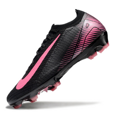 Botas de fútbol Nike Air Zoom Mercurial Vapor 16 Elite negras y rosas para terreno firme (FG).