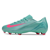 Botas de fútbol Nike Zoom Mercurial Vapor 16 Academy azul claro y rosa para terreno firme (FG).