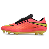 Botas de fútbol Nike Phantom Hypervenom Elite rosa y verde para terreno firme (FG).