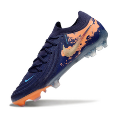 Scarpa da calcio Nike Phantom GX2 Elite DF blu e bianca per terreni compatti FG