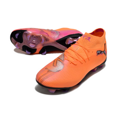 Bota de fútbol Puma Future 8 naranja y rosa para terreno firme FG