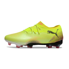Botas de fútbol Puma Future 8 Low amarillas y rosas para terreno firme FG