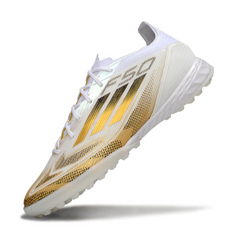 Bota de fútbol Adidas F50 Elite Turf TF blanca y dorada