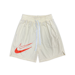 Pantalones cortos Nike color beige y rojo