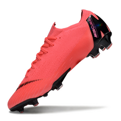 Botas de fútbol Nike Zoom Mercurial Vapor 13 Elite FG para terreno firme en color rosa salmón y negro