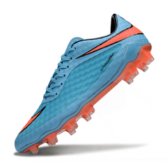 Botas de fútbol Nike Phantom Hypervenom Elite azul claro para terreno firme (FG).