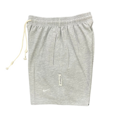 Pantalones cortos Nike grises y blancos